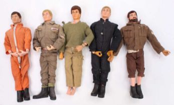 A collection of 5 vintage Palitoy Action Man Dolls, all with flock hair and all dressed in