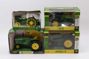 ERTL 1/16th scale boxed group of John Deere Tractors comprising a 1950 Model B, a 1960 1010 Tractor,