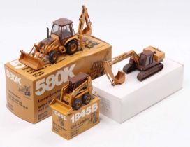 A collection of Case 1/35 scale boxed earth moving and construction diecast vehicles to include a