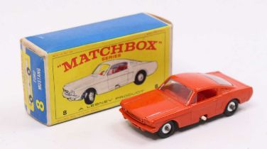 Matchbox Lesney No. 8 Ford Mustang, burnt orange body, with a red interior, and a black base, sold