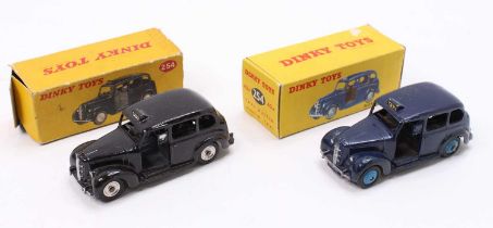 Dinky Toys boxed No. 254 Taxi group, 2 examples with the first in black, with dark grey interior &