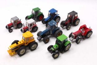 A collection of 9 various Britains Tractors, with examples including a County 1884 Tractor, a New