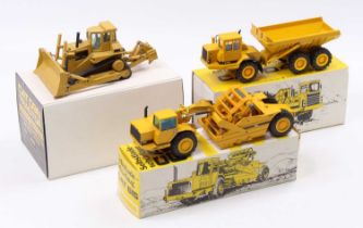 Three boxed 1/50 scale Caterpillar related earth moving construction vehicles including a NZG 298