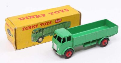 Dinky Toys No. 420 Forward control lorry comprising of green cab and back with red hubs, housed in