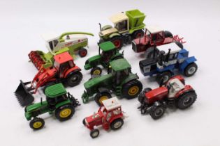 A mixed collection of Britains and ERTL tractors and farming equipment to include a Britains ERTL