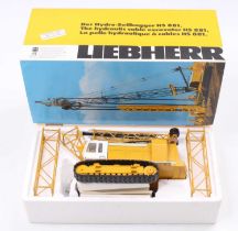 A Conrad 2831 1/50 scale diecast model of a Liebherr hydraulic cable excavator HS881, housed in