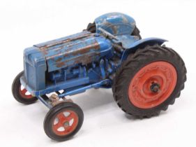 A Chad Valley diecast and clockwork model of a Fordson Super Major Tractor, comprising blue body
