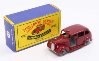 A Matchbox 1-75 series No.17 Metropolitan Taxi, comprising maroon body with grey interior and tan
