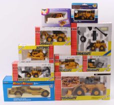 One box containing 11 boxed Joal and Siku/Ertl earth moving diecast vehicles to include an Ertl