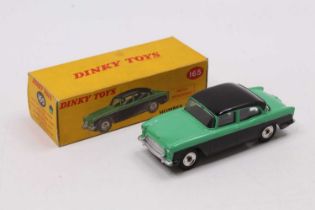 Dinky Toys No. 165 Humber Hawk comprising light green and black body with spun hubs in the