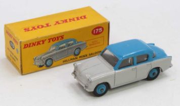 A Dinky Toys No. 175 Hillman Minx comprising of grey and blue body with matching blue Supertoys hubs