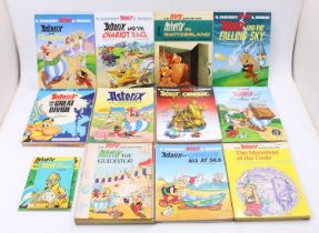 One box containing 30+ various Asterix hard back and soft back books, to include Asterix in