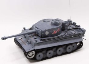 A Heng-long radio controlled No. 3818-1 German Tiger tank, with handset and various accessories