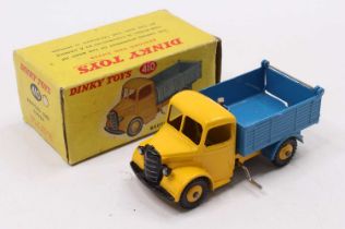 Dinky Toys No. 410 Bedford End Tipper Truck, yellow cab and chassis with yellow hubs and blue
