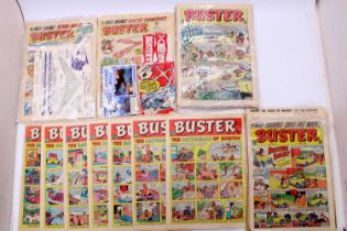 A quantity of 1962 Buster comics, two examples to include free gifts, one being a card model of a