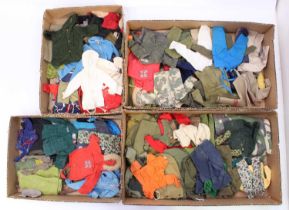 A large collection of vintage Palitoy Action Man clothing including various military uniforms,