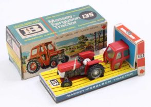 Britains No. 9529 Massey Ferguson 135 tractor, comprising of grey, red and white body with silver