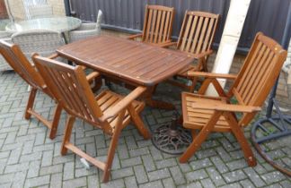 A contemporary stained and slatted pine garden patio suite, comprising; extending table, and six