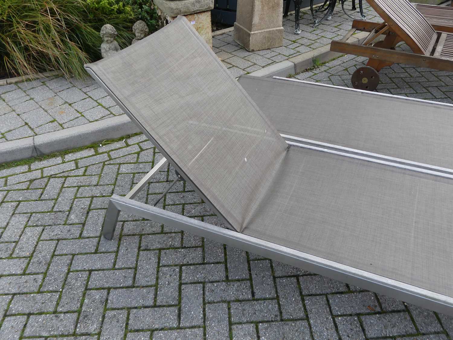 A pair of contemporary teak aluminium clad and canvas inset sun loungers, each with ratchet - Image 2 of 2