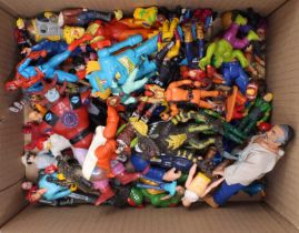 A collection of children's action figures, with examples including Thundercats, The Incredible Hulk,