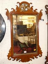A circa 1900 mahogany Chippendale style fret cut rectangular wall mirror, 85 x 51.5cm