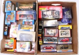 2 trays containing a collection of mixed modern issue diecasts, with examples including a Saico 1/