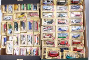 3 trays containing a collection of Lledo Days Gone and Promotional diecasts