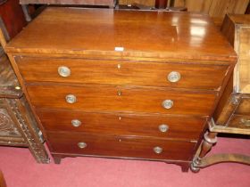 An early 19th century mahogany caddy chest, of four long graduated drawers, w.91cm