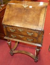 A figured walnut, cross and feather banded lady's writing bureau, in the Queen Anne taste, having