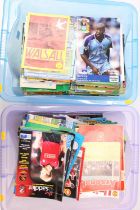 2 boxes containing a large collection of Football Programmes, with teams including Arsenal, Leyton