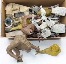 A collection of vintage Kenner Star Wars vehicles and figures to include Jabba The Hut, Rancor, At-