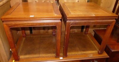 A pair of contemporary Eastern hardwood square low Kang tables, w.51cm