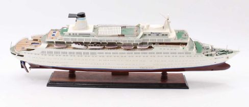 A well-built wooden model of the cruise liner 'Discovery' on a display plinth approx 31" / 790mm