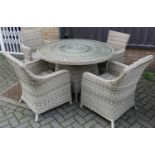 A contemporary wicker patio suite, comprising; circular table with glass inset top, dia.121cm, and