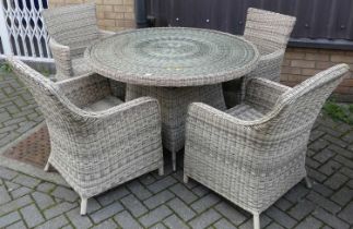 A contemporary wicker patio suite, comprising; circular table with glass inset top, dia.121cm, and