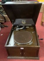 A His Masters Voice model 103 oak cased gramophone, beariung a label for Goulden & Wind, Dover, 41cm