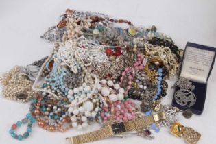 A large collection of mainly modern and costume jewellery to include Scottish style white metal