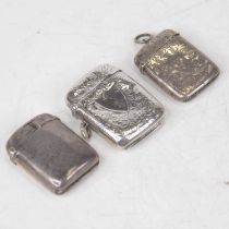A late Victorian silver vesta, of hinged rectangular form, having floral engraved decoration and