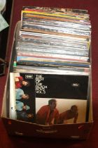 A box of assorted vinyl, various dated and genres, mainly being LPs, some 12" to include Abba -