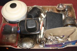A box of miscellaneous metalware to include a silver plated trophy cup and cover for the Cottenham