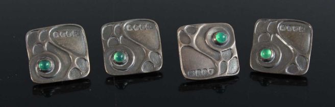 A set of four continental Art Nouveau silver and glass dress buttons, each with import marks for