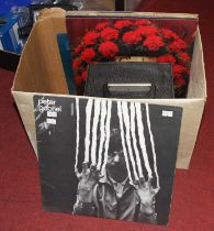 A box of vintage 12" records to include Peter Gabriel - self titled, and Dr Hook - A Little More,