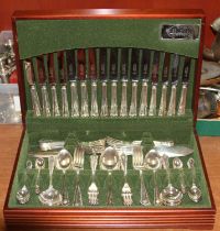 Butler At Harrods, a mahogany cased 12 place setting canteen of silver plated cutlery (appears