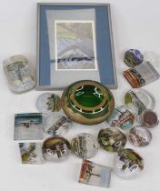 A collection of glass paperweights, each reverse printed with a topographical view, to include the