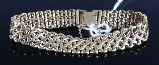 A modern 9ct gold fancylink bracelet, with hinged deployment clasp and safety chain, 12.3g