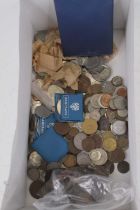 A collection of miscellaneous coins and bank notes to include British First Decimal Coin Wallet,