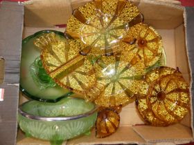 A box of glassware to include moulded amber glass dishes, and art deco frosted green bowl with