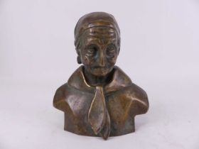 A cast brass head & shoulders bust of an elderly lady, height 22cm