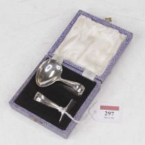 A George VI silver baby's spoon and pusher, in fitted case
