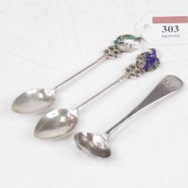 A pair of believed Australian sterling silver teaspoons, each terminal enamel decorated with a bird;